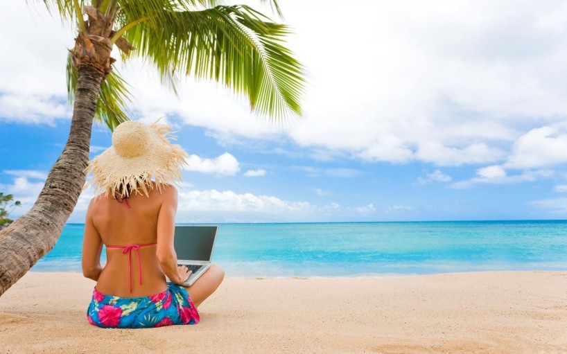 woman-on-the-beach-with-her-laptop-2771